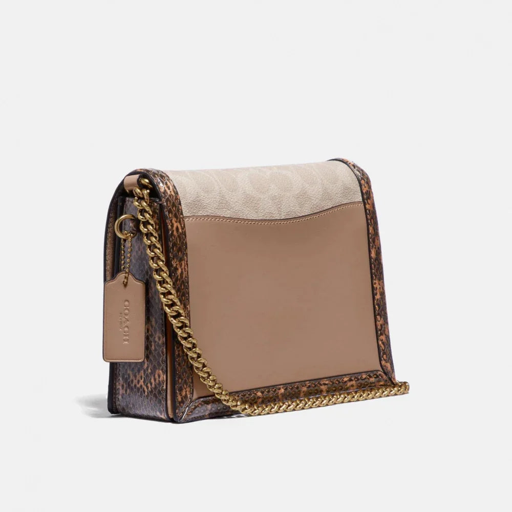 COACH HUTTON SHOULDER BAG IN BLOCKED SIGNATURE CANVAS WITH SNAKESKIN DETAIL