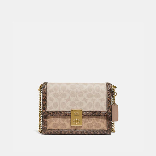 COACH HUTTON SHOULDER BAG IN BLOCKED SIGNATURE CANVAS WITH SNAKESKIN DETAIL