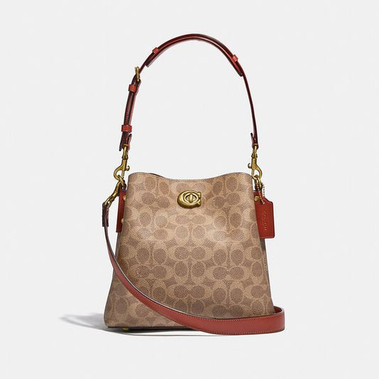 WILLOW BUCKET BAG IN SIGNATURE CANVAS